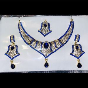 Indian style necklace with earrings and tikka
